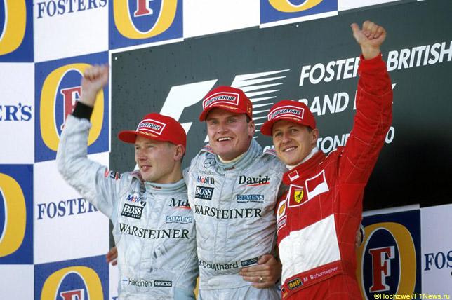 Подиум Гран При Великобритании 2000 года: Хаккинен, Култхард, Шумахер
