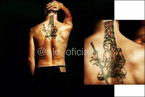 Татуировка на спине Фернандо Алонсо