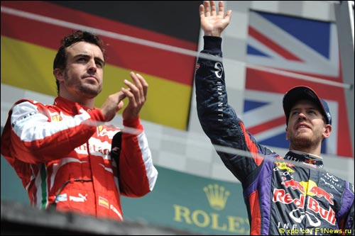 Фернандо Алонсо и Себастьян Феттель на подиуме Гран При Канады