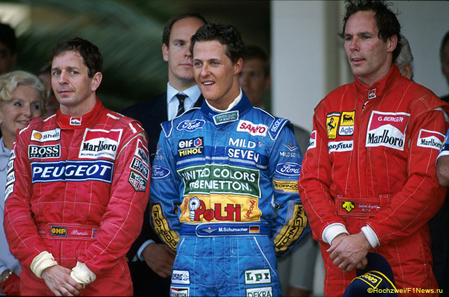 Мартин Брандл (слева) на подиуме в Монако в 1994 году вместе с Михаэлем Шумахером и Герхардом Бергером