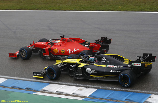 Машины Ferrari и Renault на трассе в Хоккенхайме