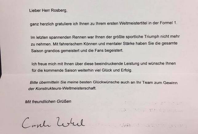 Меркель поздравила Росберга с чемпионством