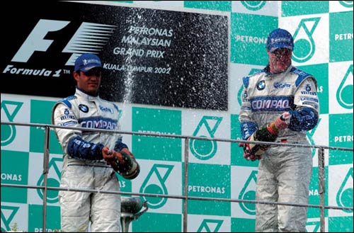Первый из трех дублей Ральф и Хуан Пабло принесли команде на Гран При Малайзии 2002 года