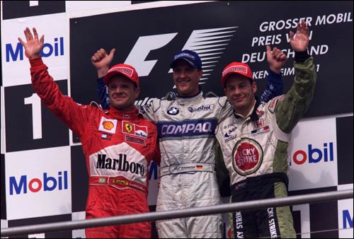 Рубенс Баррикелло, Ральф Шумахер и Жак Вильнёв на подиуме Гран При Германии 2001 года