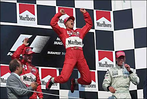 Баррикелло, Шумахер и Култхард на подиуме Гран При Венгрии 2001 года