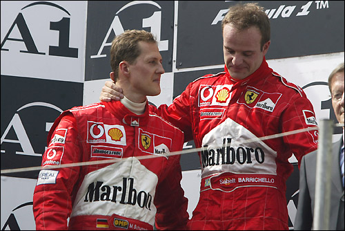 Михаэль Шумахер и Рубенс Баррикелло на подиуме Гран При Австрии