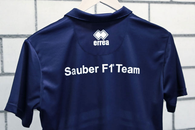 Логотип Erre&#224; на униформе Sauber