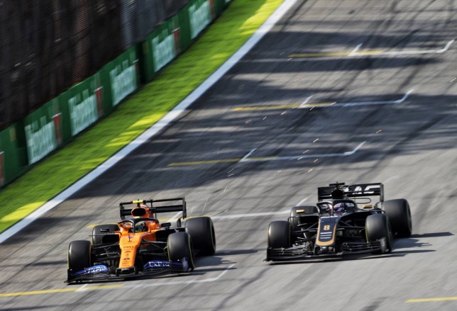 Ландо Норрис и Роман Грожан борются за позицию на Гран При Бразилии 2019 года, фото XPB