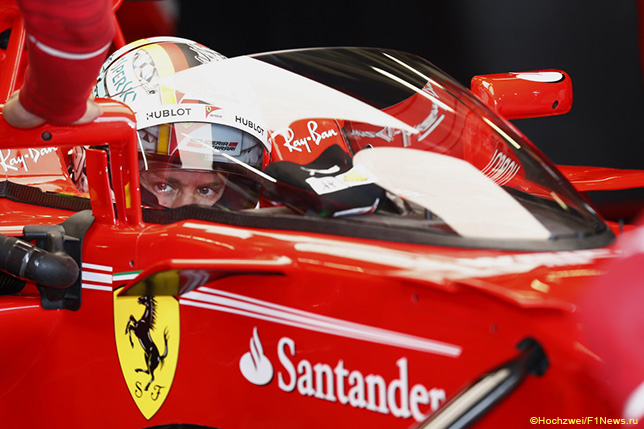 Себастьян Феттель за рулём Ferrari, на которой установлена система Shield